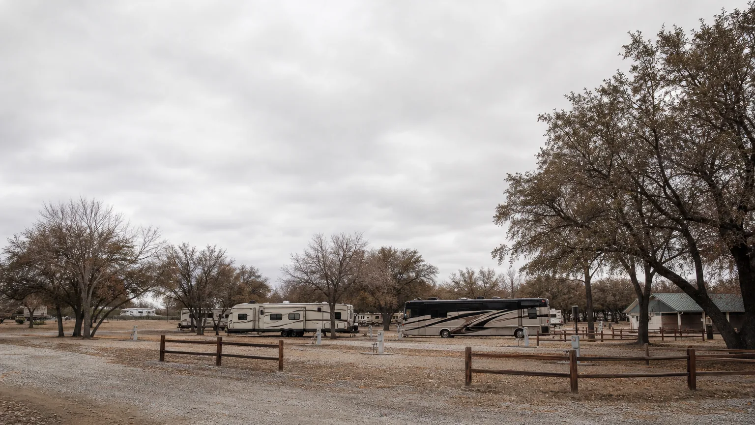 Empty off-season sites at an RV park in flat overcast light