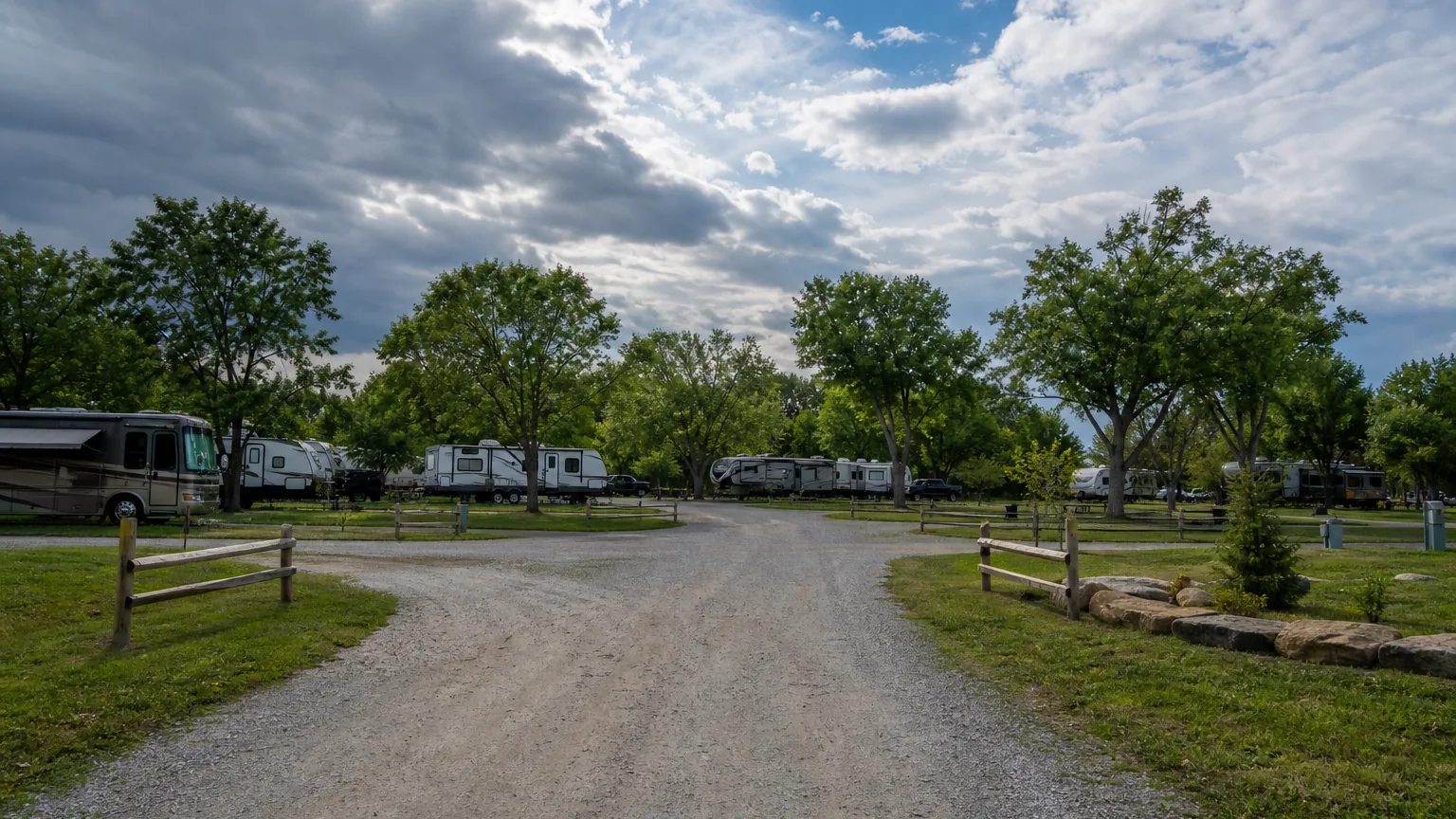 Access road toward the entrance at an RV park in storm-clearing light