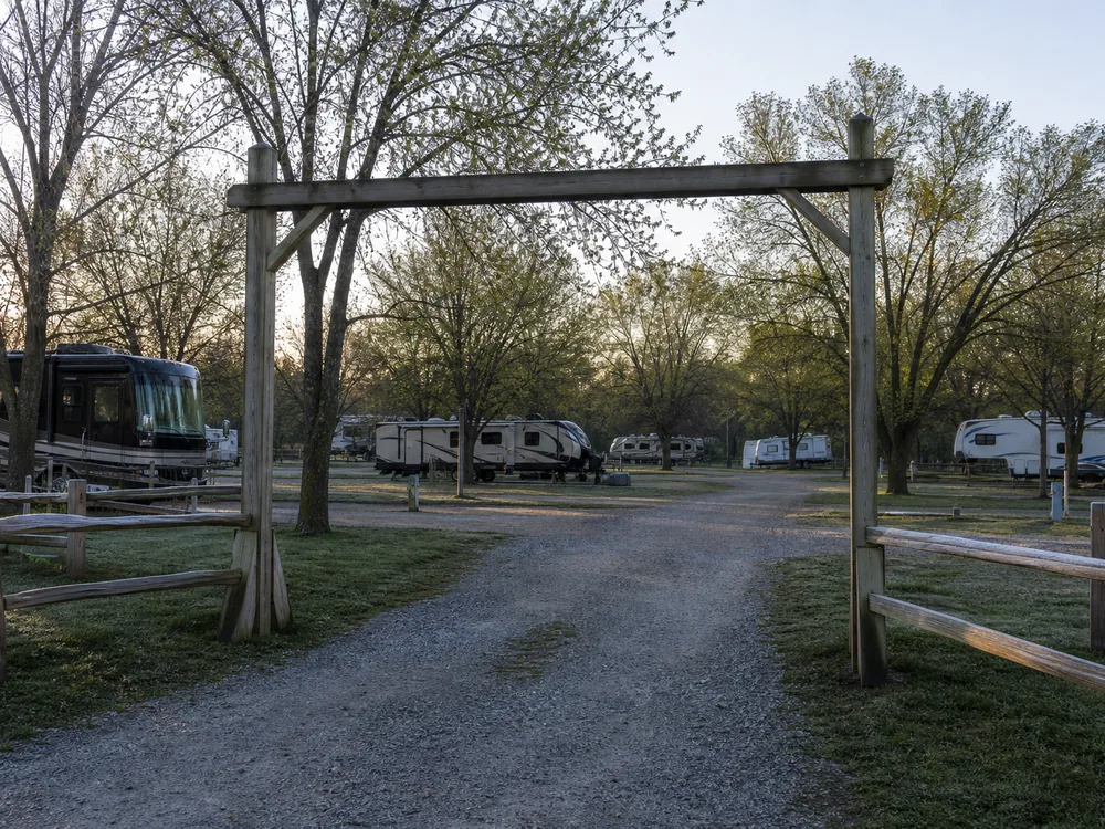 Park entry gate at dawn in early spring