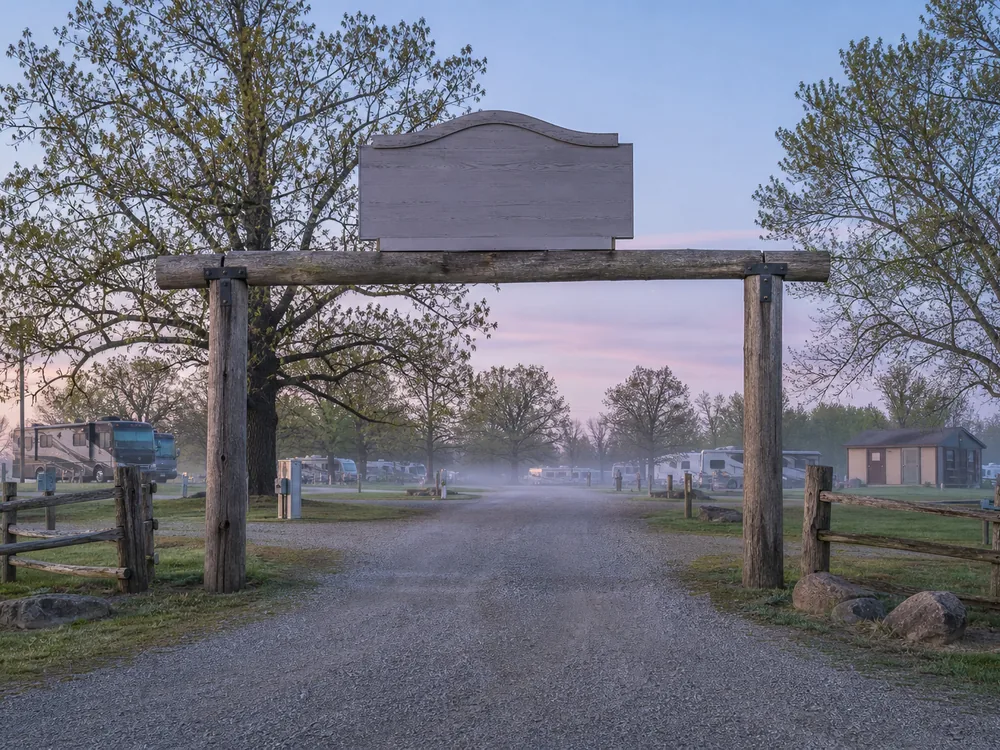Park entry gate and welcome area at dawn