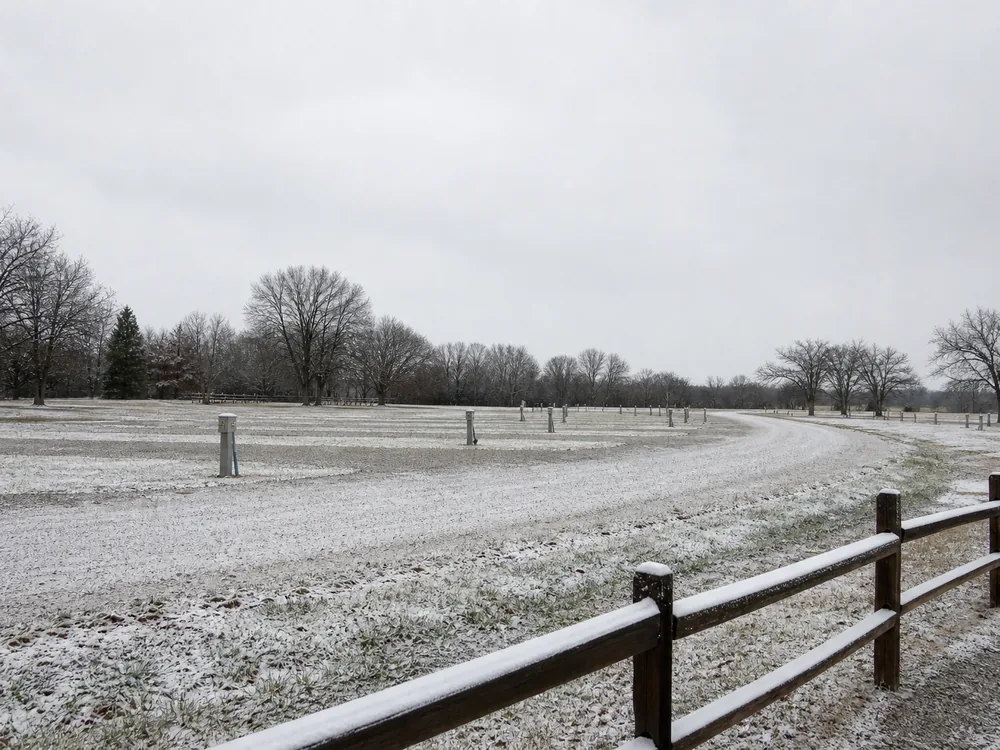 Empty off-season RV sites under winter snow